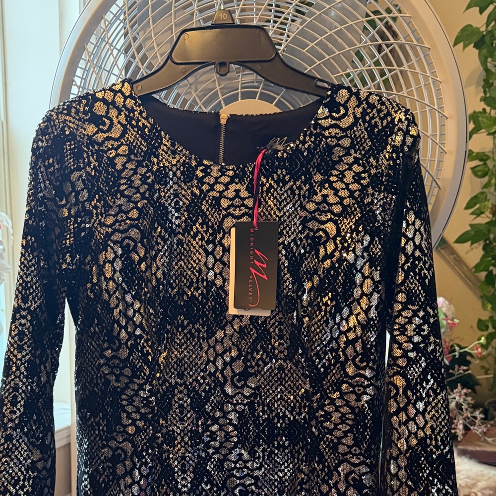 Elegant Black and Gold Patterned Dress